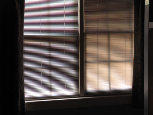 venetian blind covered windows in Geek Room